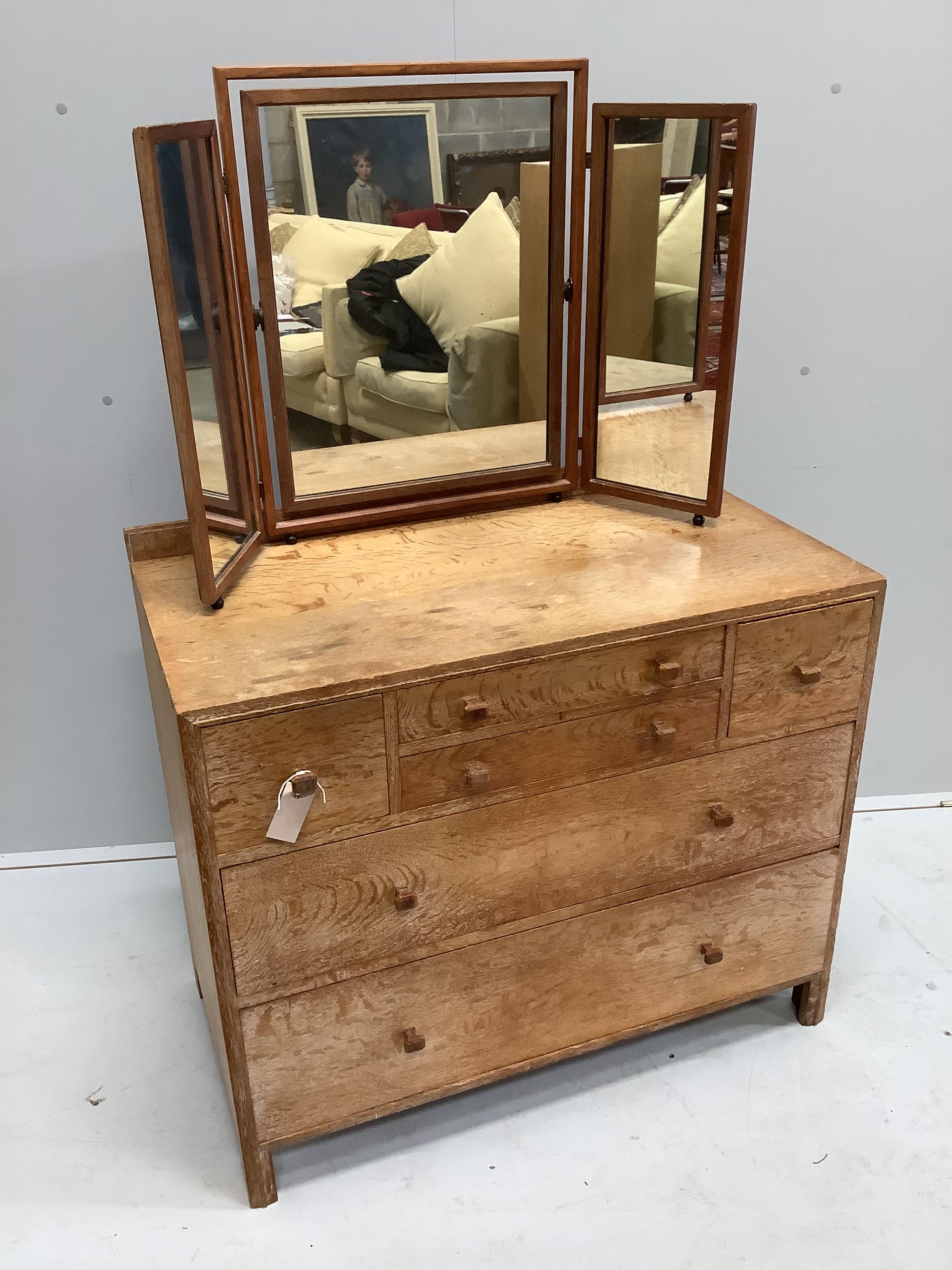 Heal & Son Ltd, London, a bleached oak six drawer chest, width 91cm, depth 47cm, height 80cm and a triple dressing table mirror